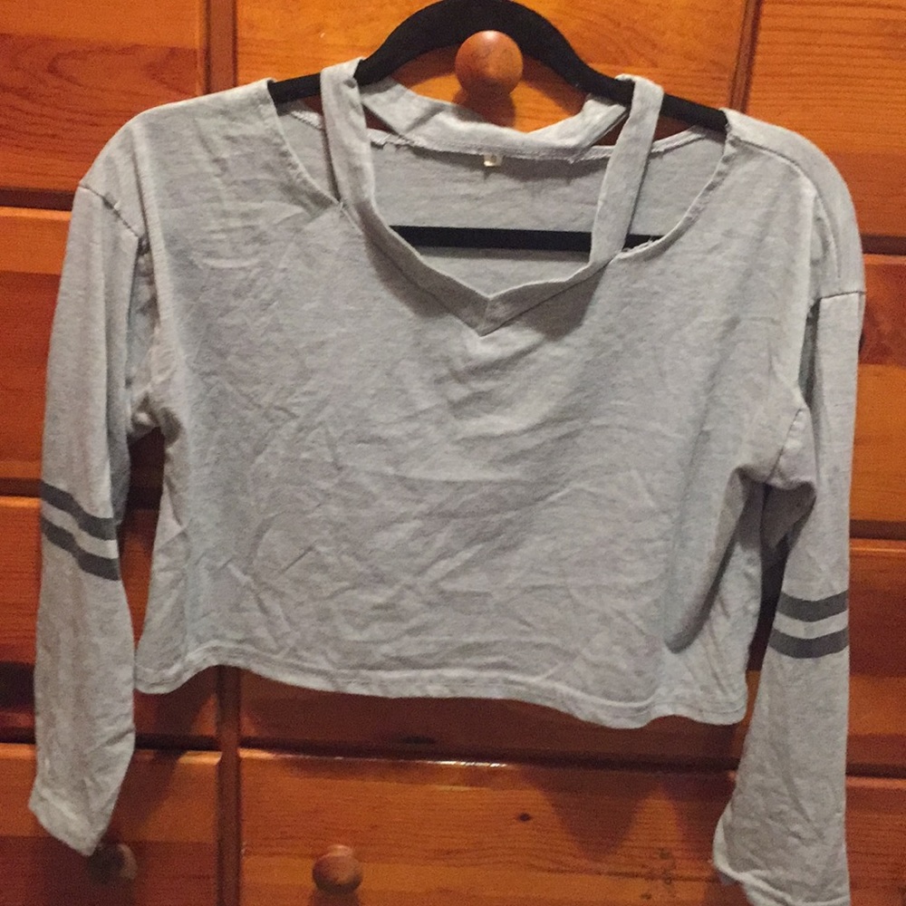 Long sleeved gray top with open shoulders